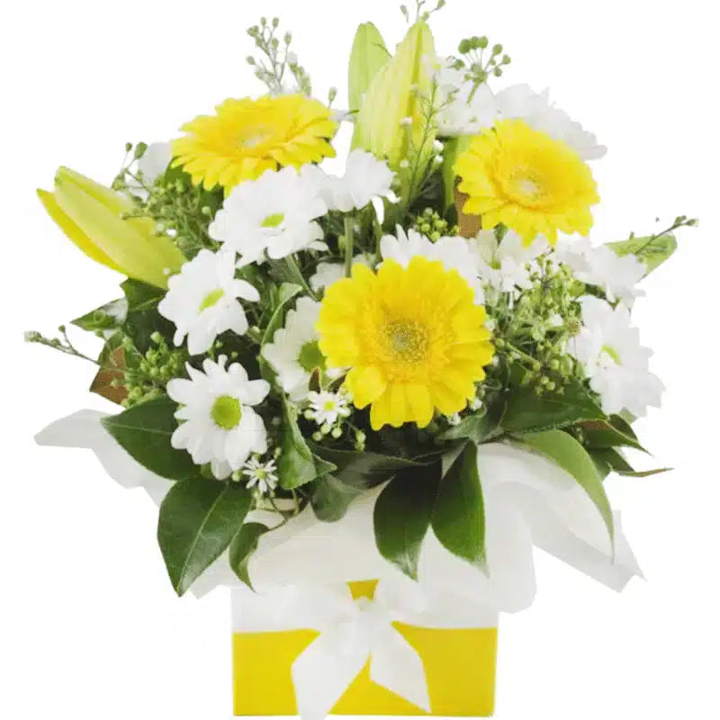 Ray of Sunshine Yellow Flower Arrangement: Yellow and white box arrangement with lilies and gerberas.