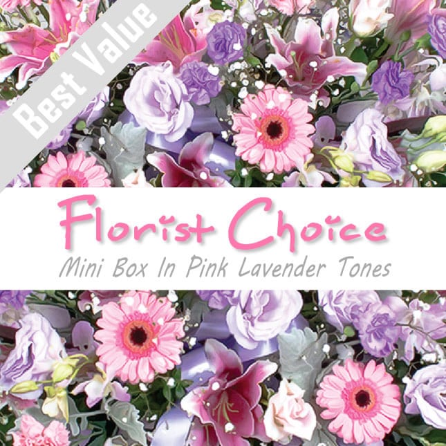 A soft pink and lavender mini box of fresh seasonal flowers, arranged with greenery for a romantic surprise.