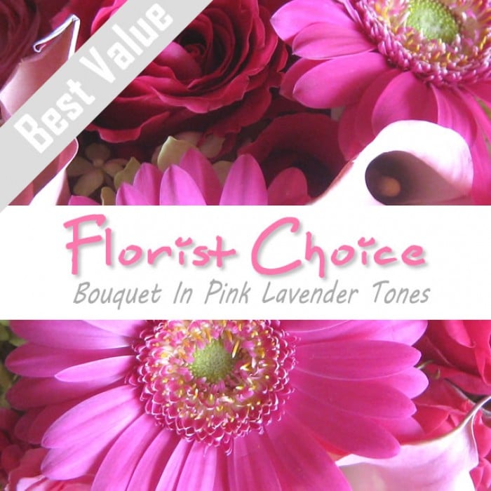 A soft pink and lavender bouquet of fresh seasonal flowers, wrapped with greenery for a romantic touch.