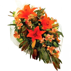 Desires Orange Bouquet: Orange bouquet with leucadendrons, lilies, and alstroemeria.
