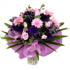 Pink and Purple Bouquet - Anastasia: Pink and purple bouquet with roses, mini gerberas, lisianthus, and greenery.