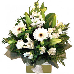 Marshmallow Heaven: White mini box arrangement with mini gerberas, lilies, and carnations.
