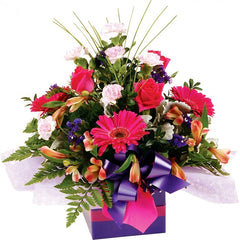 Glory Pink and Red Arrangement: Pink and red box arrangement with mini gerberas, roses, and spear grass.
