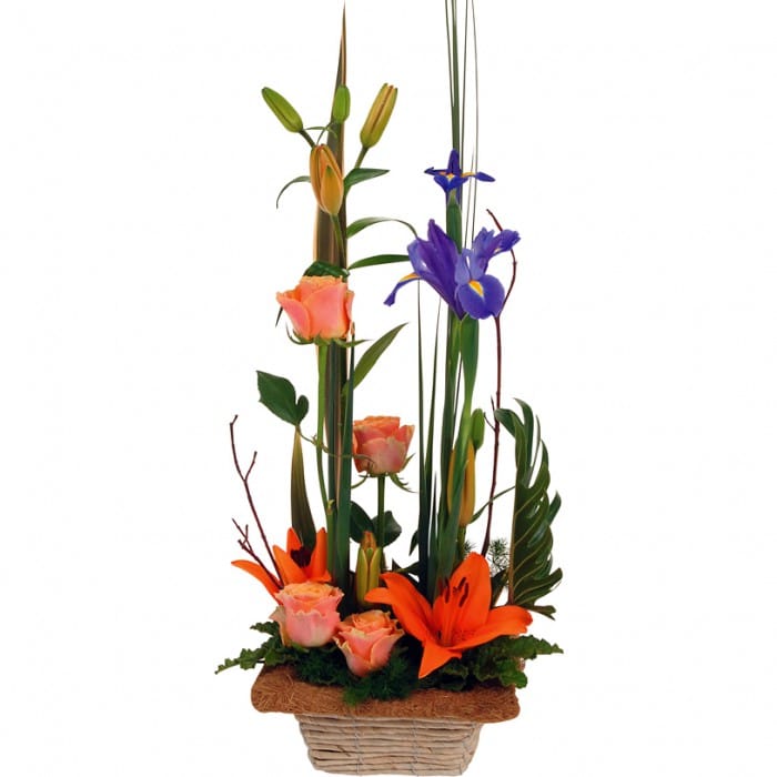 Special Treasure Basket Arrangement: Orange and purple basket arrangement with roses, lilies, and spear grass.