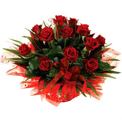 Burst Of Love- 12 Red Rose Arrangement: Box arrangement of 12 medium-stem red roses with greenery.