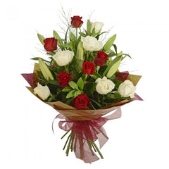 Fire and Ice: Red and white bouquet with six long-stem roses and lilium.
