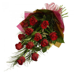 For Only You: Bouquet of 12 long-stem red roses with greenery.