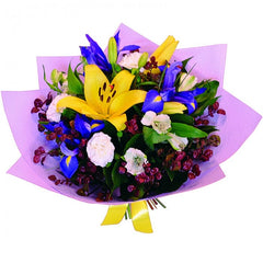Memories: Yellow, purple, and white bouquet with lilies, iris, and alstroemeria.