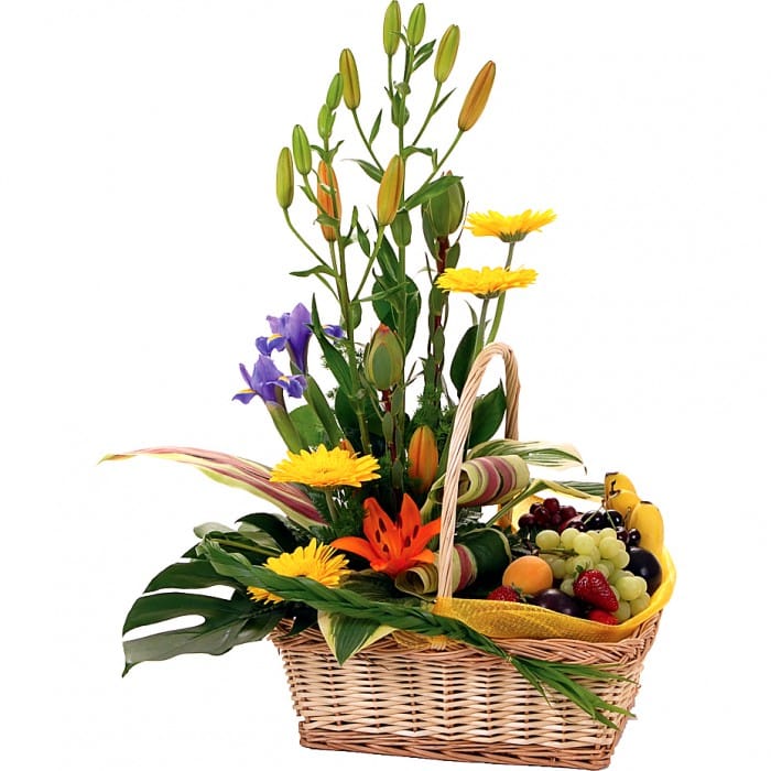 Floral Treat Fruit and Flowers: Yellow, orange, and purple basket with mini gerberas, lilies, and seasonal fruits.