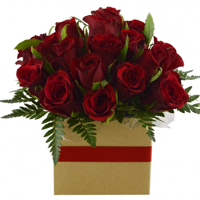 Fifty Shades Of Red: Cube arrangement of 12 short-stem red roses.